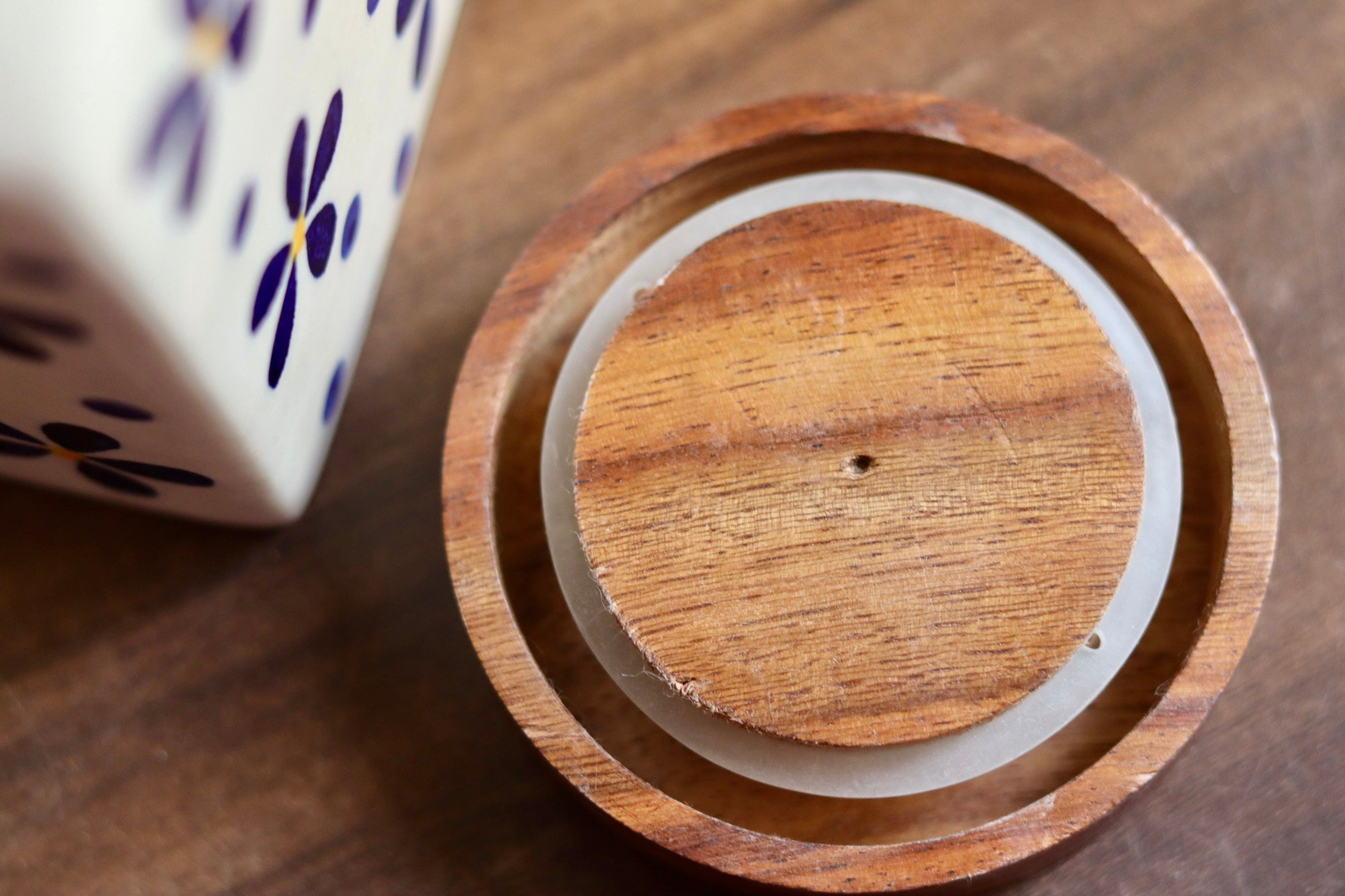 Wooden lid with jar