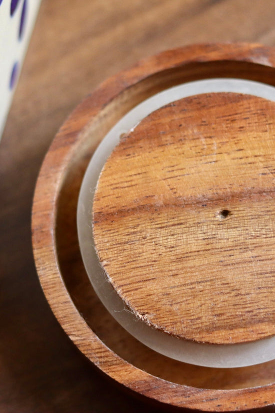 Wooden lid with jar