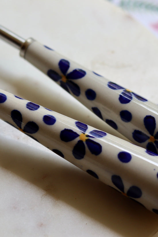 Blue floral rice serving spoons
