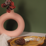 Cream round leaf platter with vase