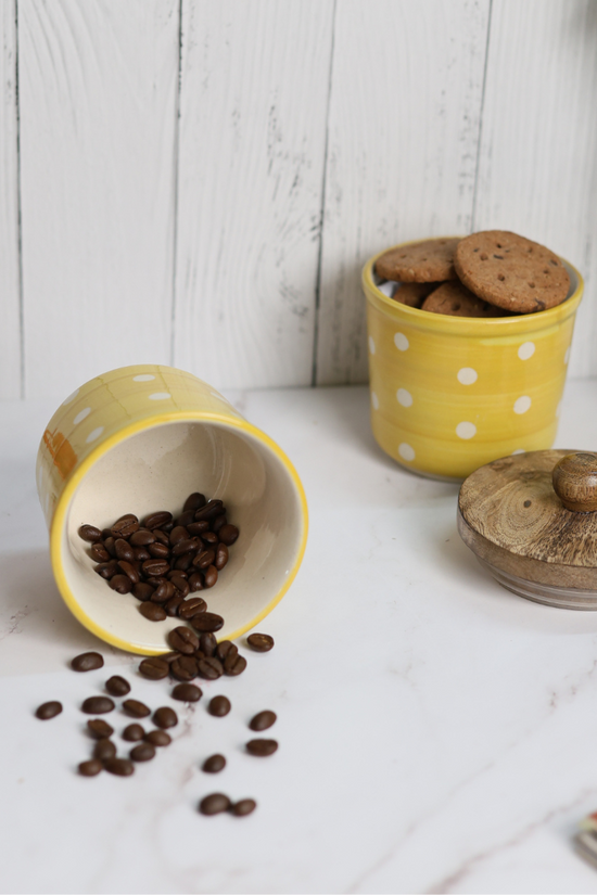 Handmade ceramic yellow polka jars with coffee bean & cookies