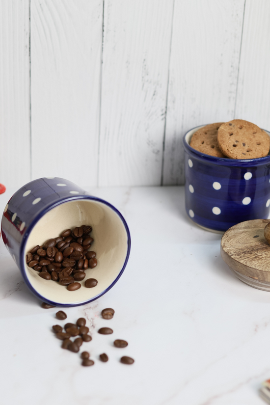 Blue polka jar with coffee beans 