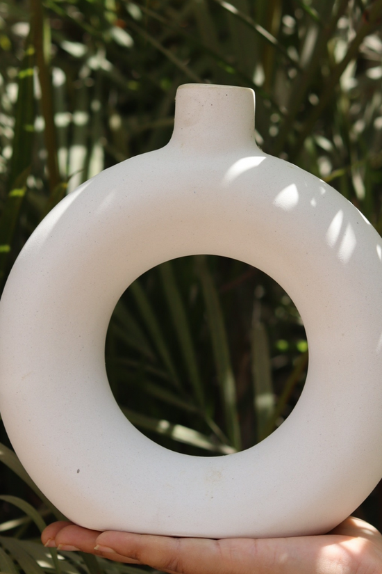 Handmade ceramic small donut vase white in hand 