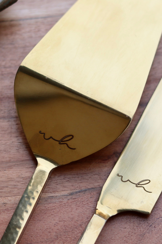 Closeup shot of cake cutter & server