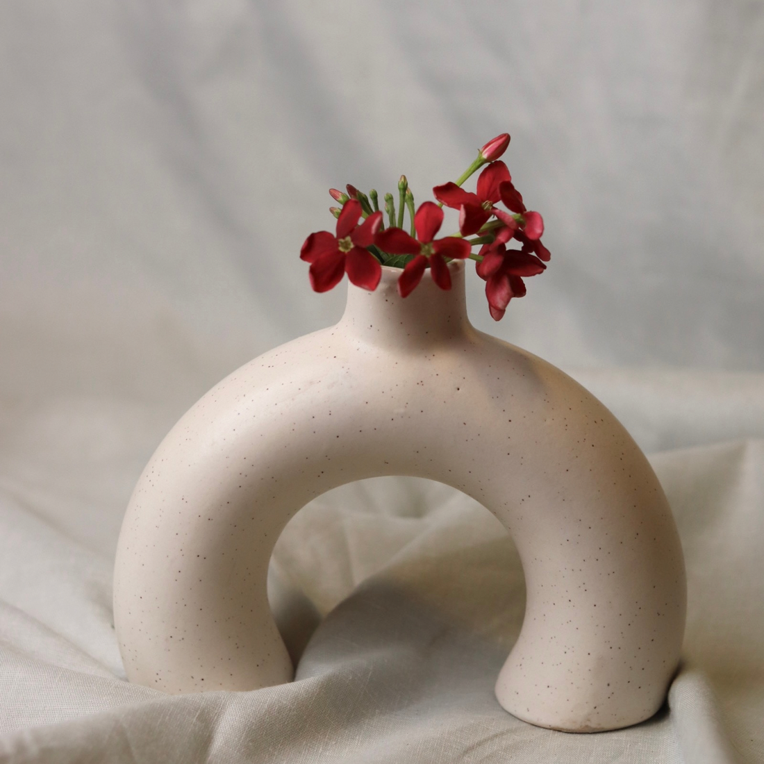 Half donut vase with flowers