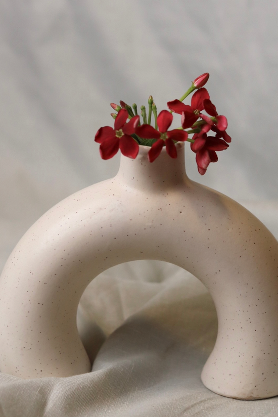 Half donut vase with flowers