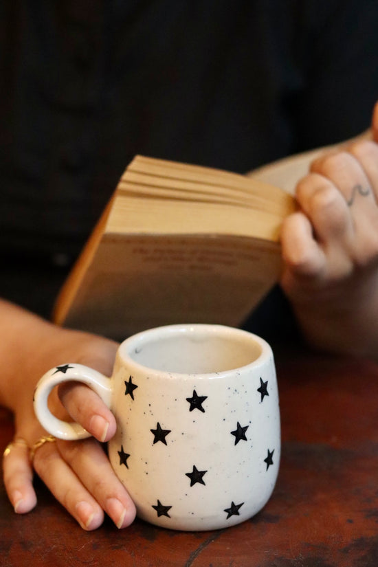 Cuddle coffee mug in hand