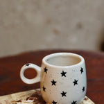 Handmade ceramic star cuddle mug 